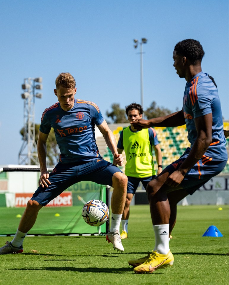 Scott McTominay and Tyrell Malacia in action this morning in Nicosia