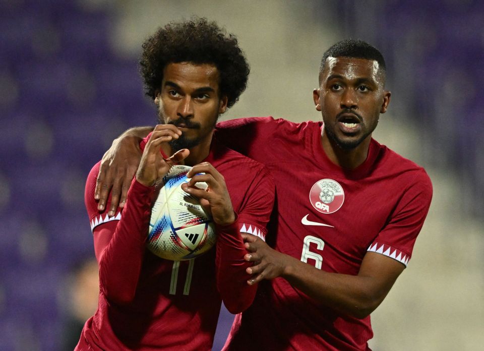 Qatar’s forward Akram Afif celebrating after scoring against Chile in an international friendly