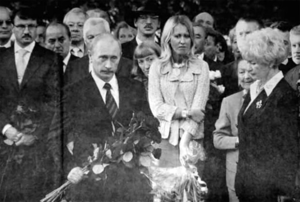 Vladimir Putin at the funeral for Anatoly Sobchak, alongside his daughter Ksenia Sobchak (centre) and wife Liudmila Narusova (right)