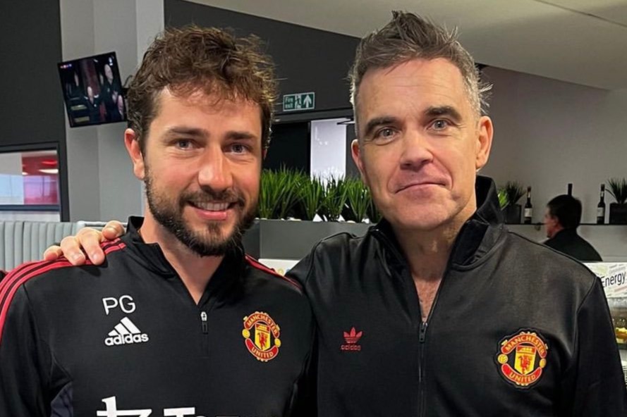 Robbie Williams posed for a photo with fitness coach Paolo Gaudino