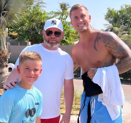 Dan Osbourne shared a snap with ex-football star Wayne Rooney after bumping into him on holiday