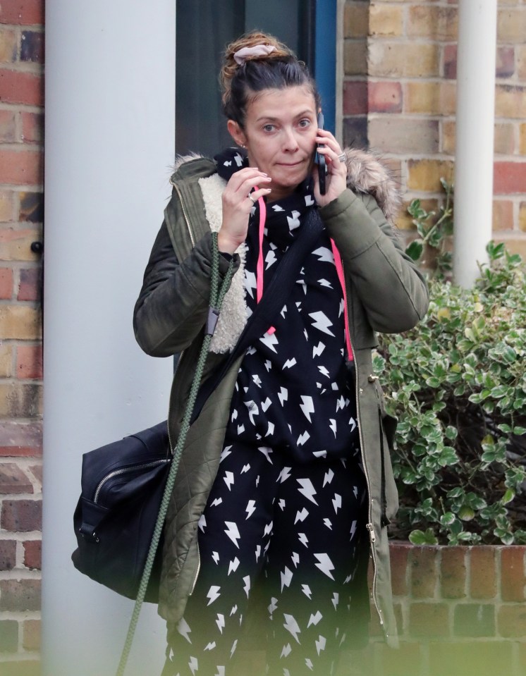 Kym was seen looking downcast as she exited her London Hotel with her husband and daughter