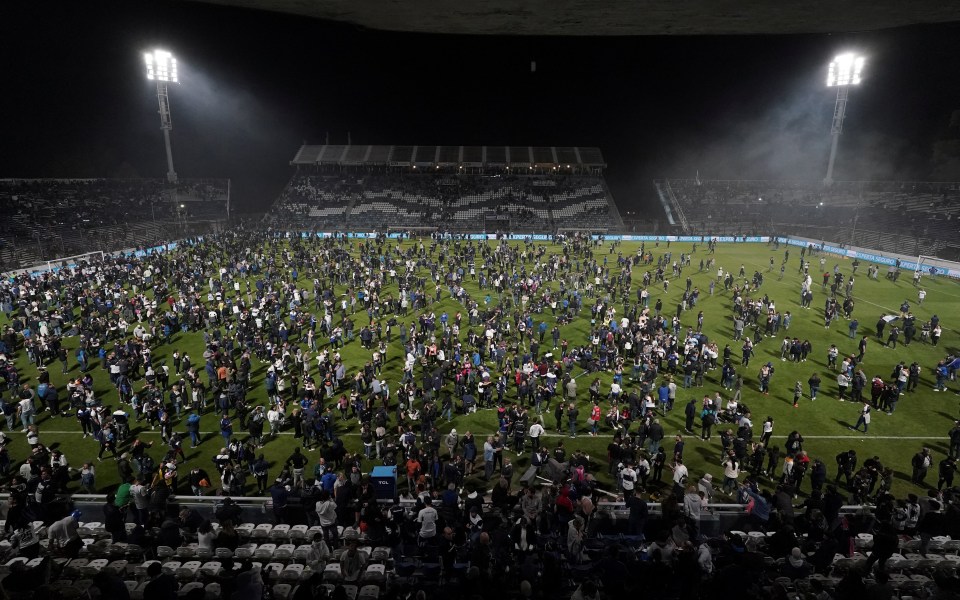 An overview of Gimnasia's stadium as chaos descends