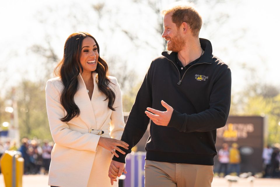 A royal biographer joked Meghan Markle might like to trade up Harry for Elon Musk