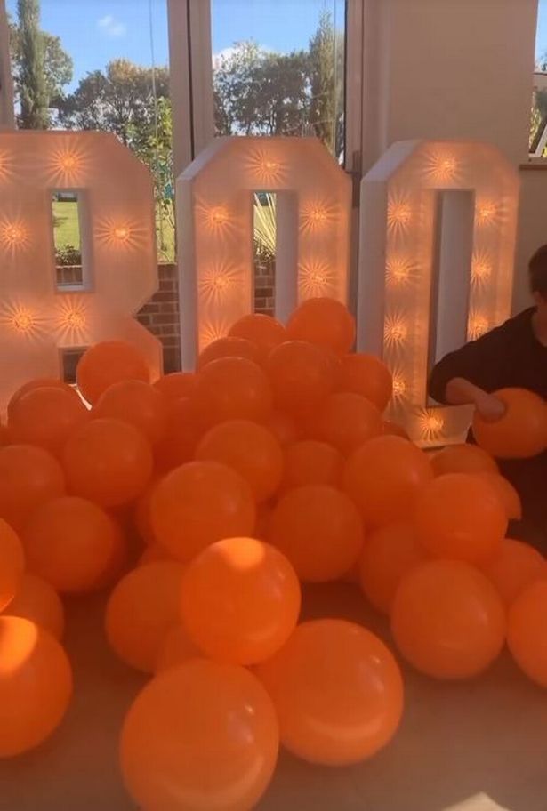 The Essex star decorated her house with orange balloons