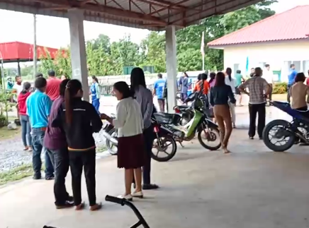 People gathered outside the daycare centre following the horror massacre