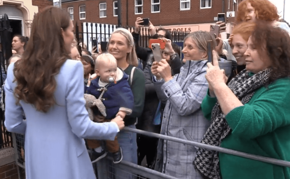 Kate smiled and continued to greet other members of the crowd