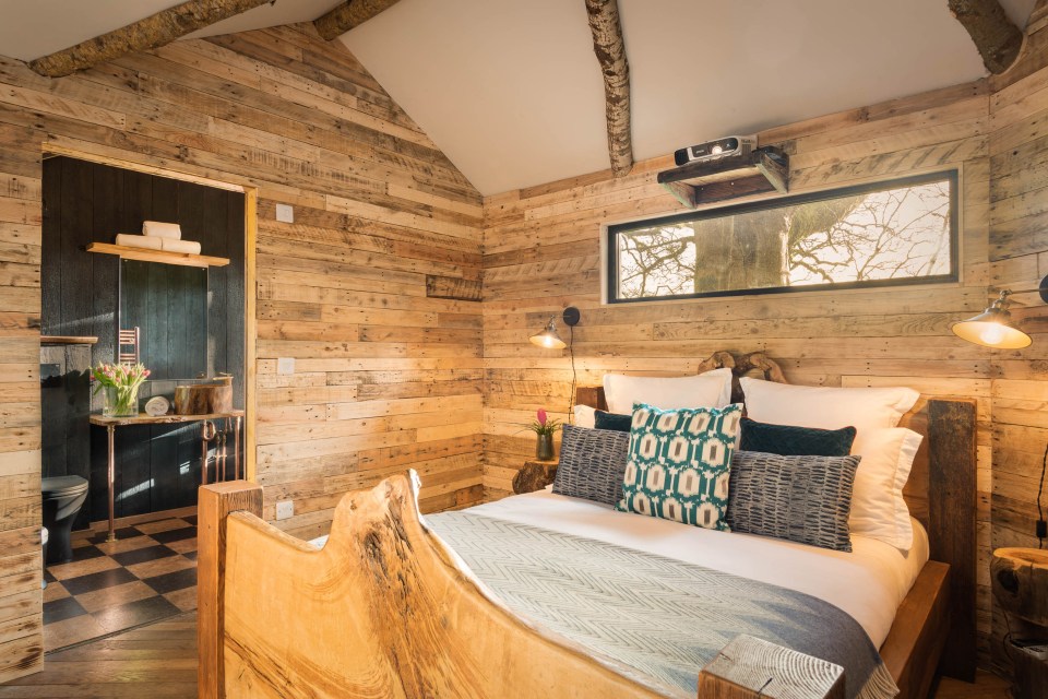 The secluded treehouse includes a stylish double bedroom