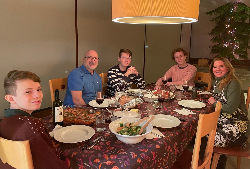 The family enjoying Christmas dinner together