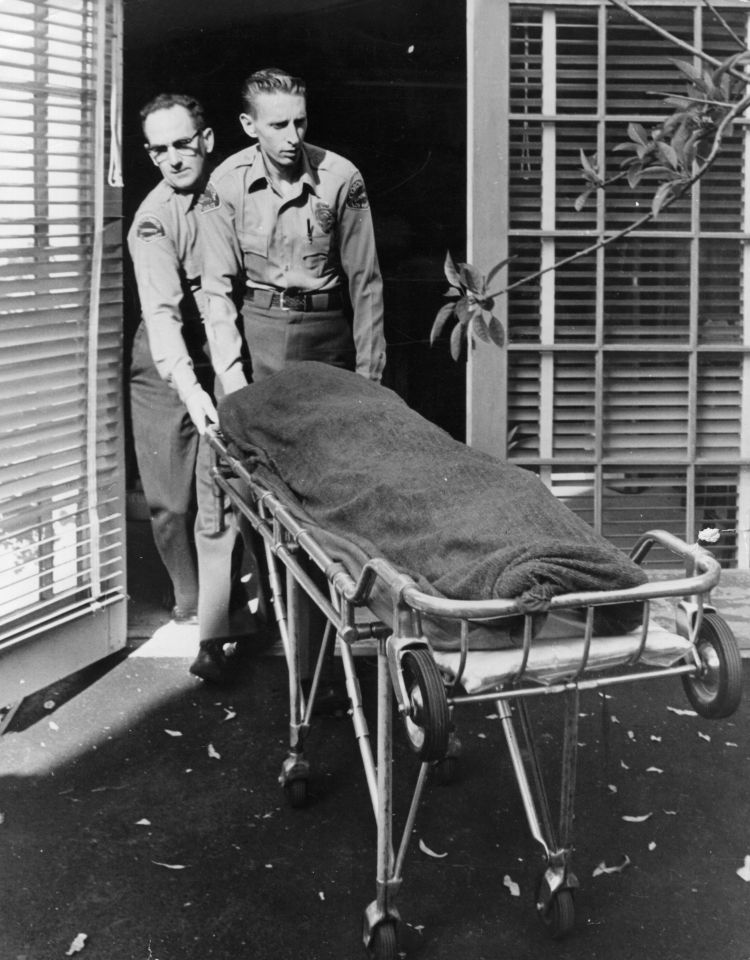 Monroe's body being removed from her Los Angeles home in 1962