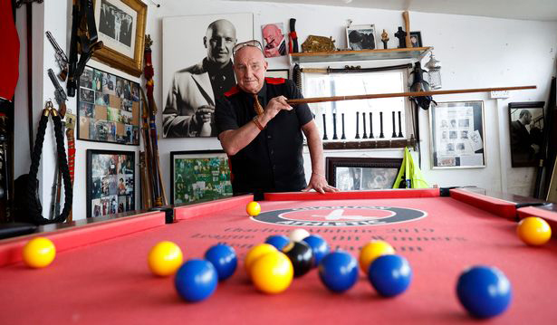 The 63-year-old's 'castle' is complete with suits of armour, a bust of his own head and fake weapons