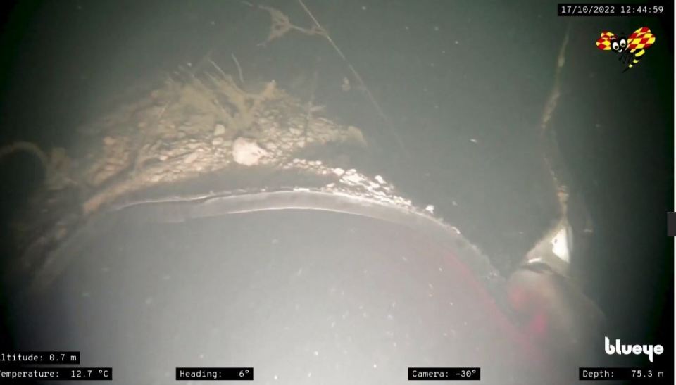 Images show a section of pipeline ripped open by an explosion on the sea bed