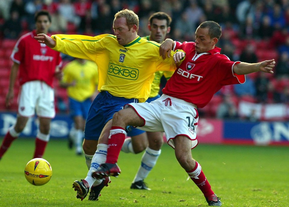 Layton Maxwell (L) appearing for Cardiff City against Barnsley in 2002