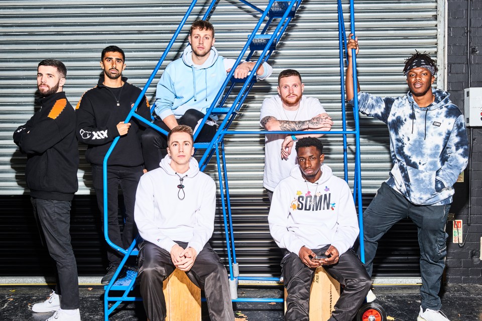 Tobi Brown, front right, is one of the seven members who make up the "Sidemen"