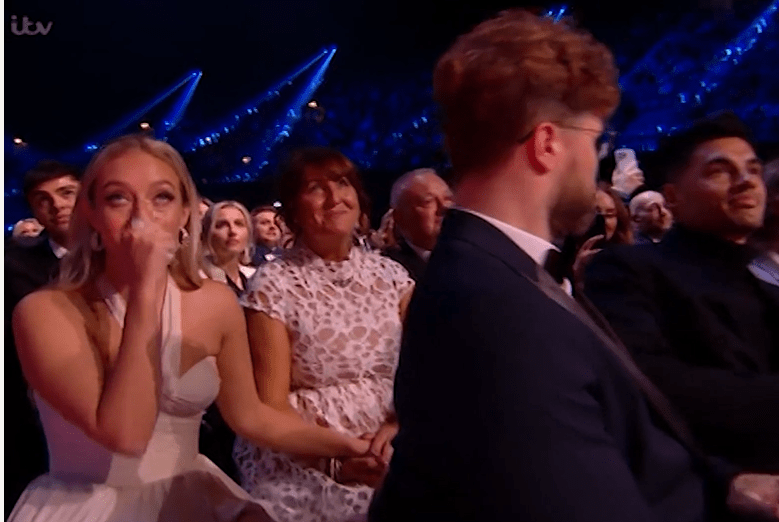 Tom Parker's wife Kelsey was seen getting very emotional after a video of her late husband played at the NTAs