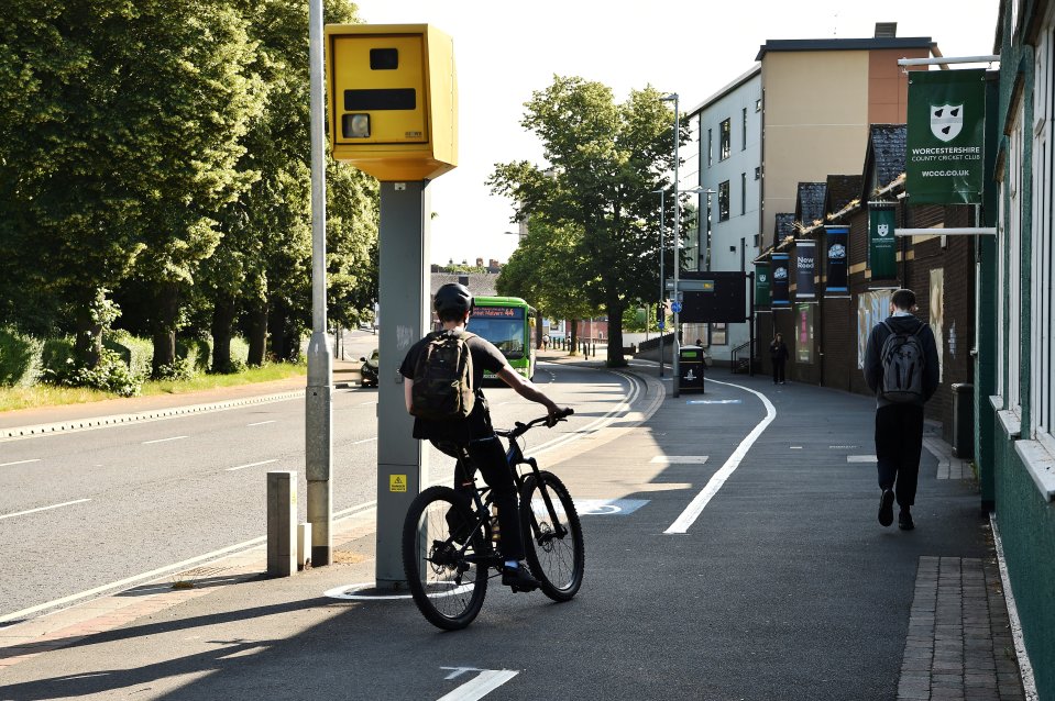 The cycle lane has various obstacles to navigate including a speed camera, bins and trees, all in the way of the route