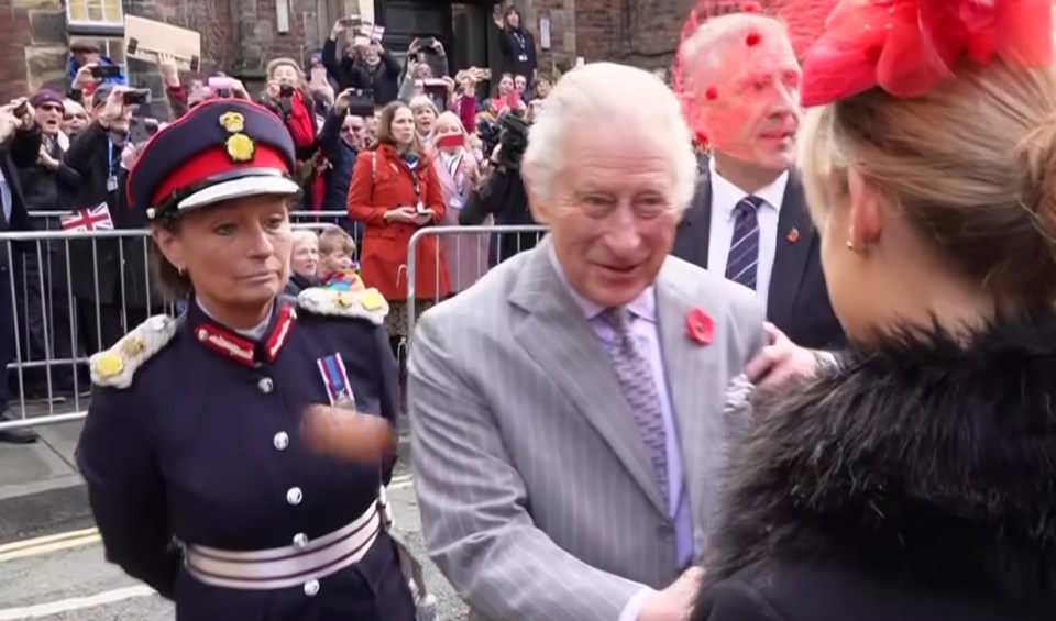 The moment the egg flew past the monarch after it was lobbed by a yob