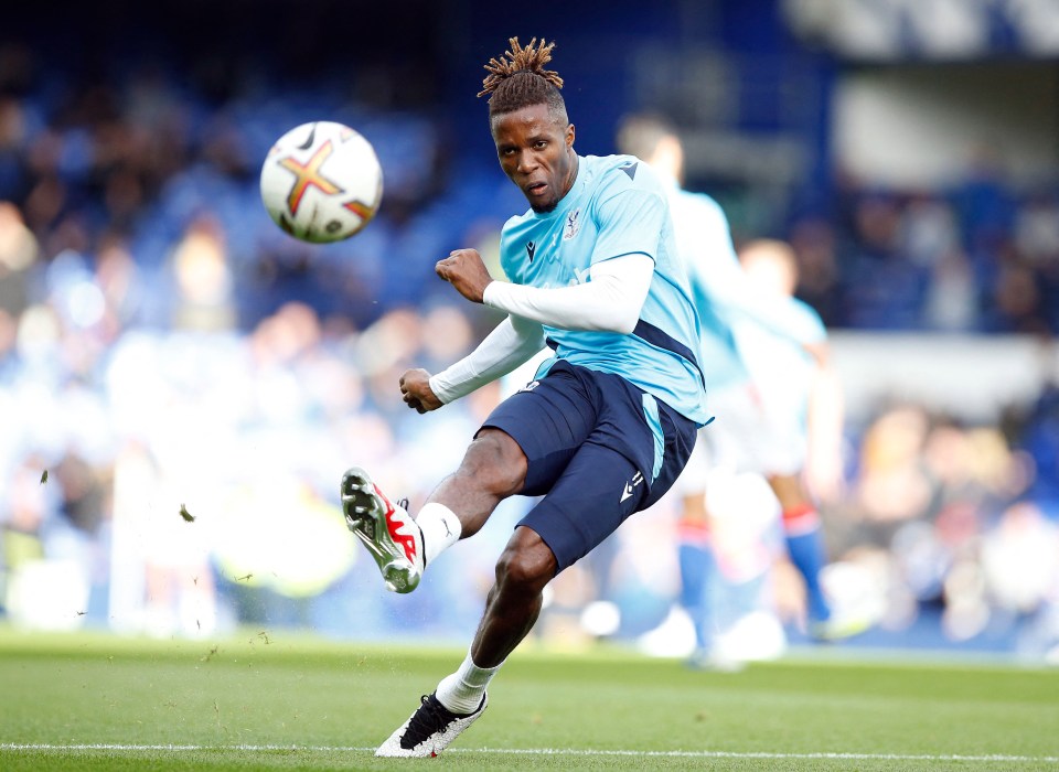 Arsenal and Chelsea target Wilfried Zaha is holding off on a new Crystal Palace deal... for now