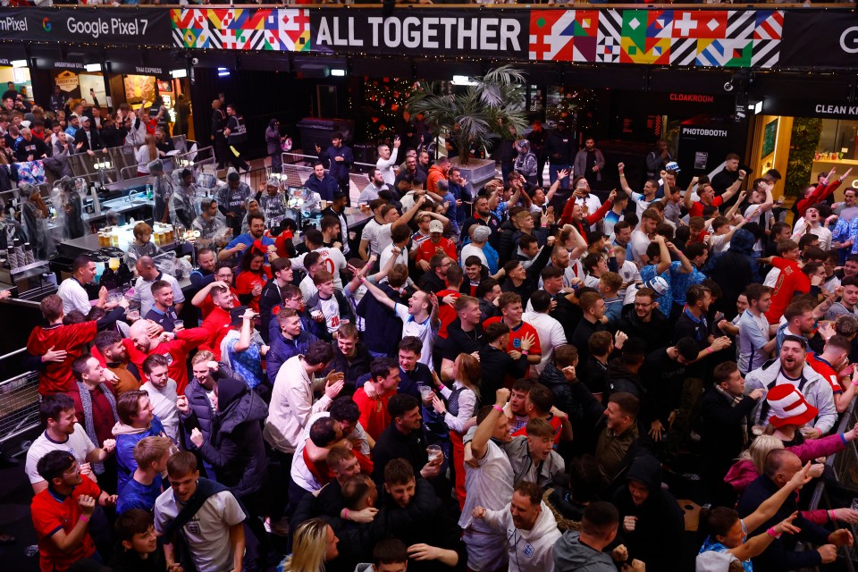 England fans scream and chant as the Three Lions score