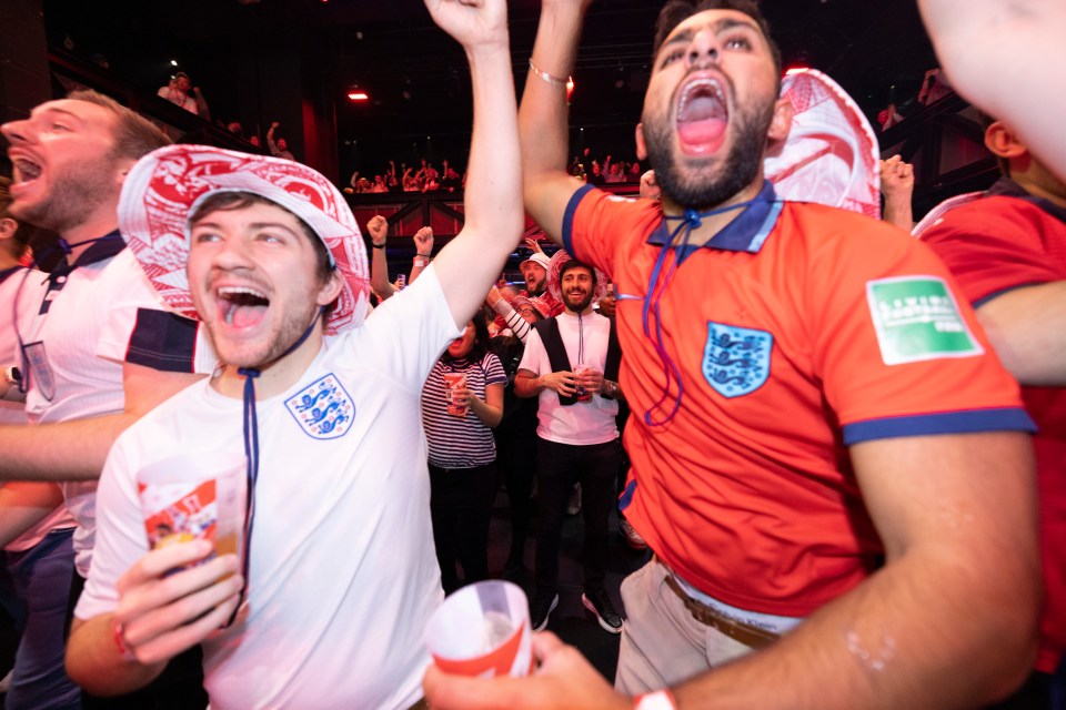 Fans in Boxpark Wembley celebrate England's first of six goals