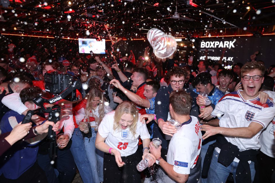 Revellers roar as they celebrate England's goals at Box Park, Shoreditch