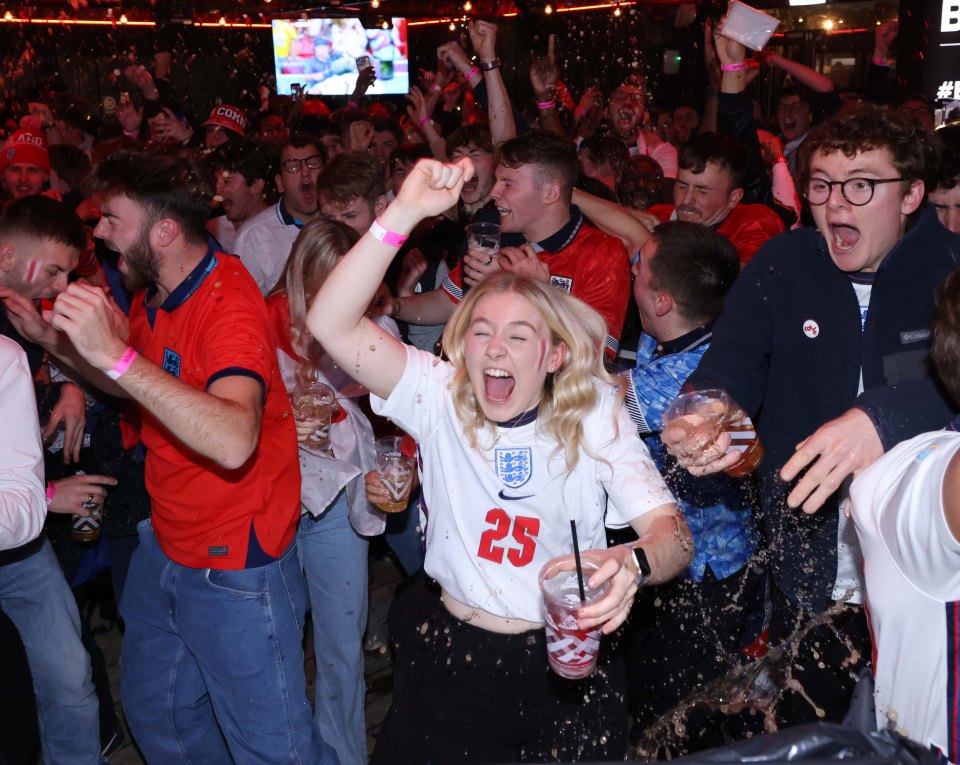 A Three Lions supporter going crazy in Shoreditch