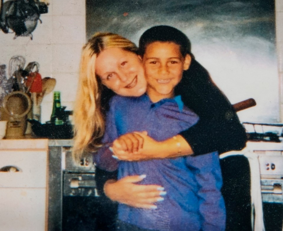 Alison grabs a hug with Josh as a youngster