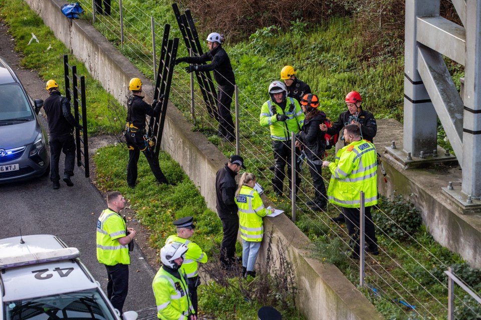 An activist is detained after she tried to occupy a gantry between J28 and J29