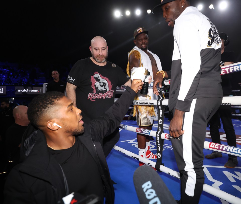 Anthony Joshua and Dillian Whyte embrace