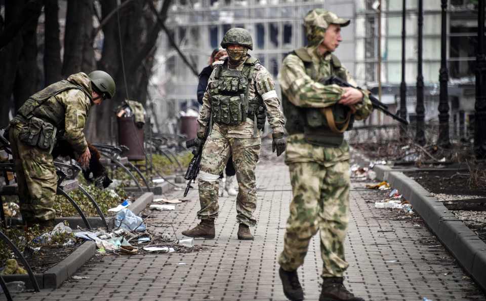 Washington accused Pyongyang of covertly shipping a 'significant number' of artillery shells to Russia (pictured: Russian soldiers in Mariupol)