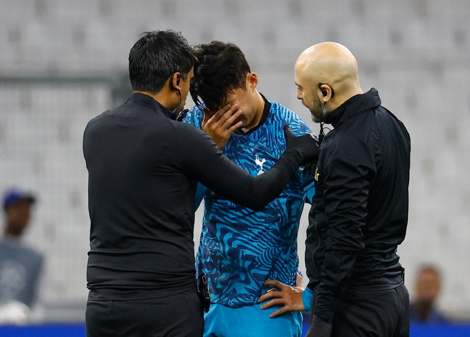 Son Heung-min was forced off following a collision with Chancel Mbemba