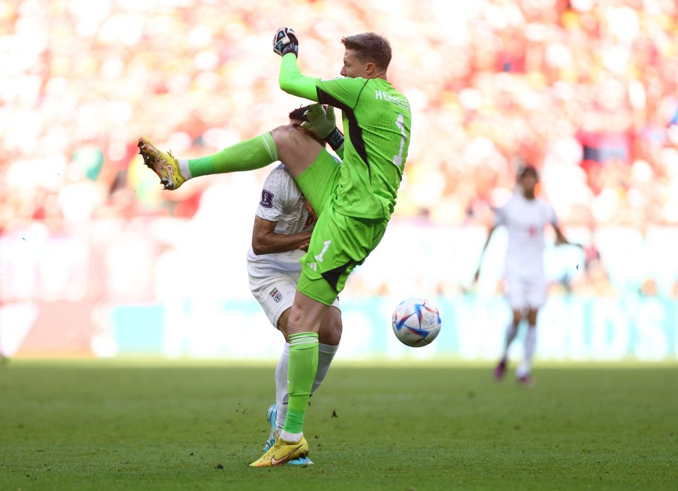 Wales keeper Wayne Hennessey was sent off for whacking Iran's Mehdi Taremi