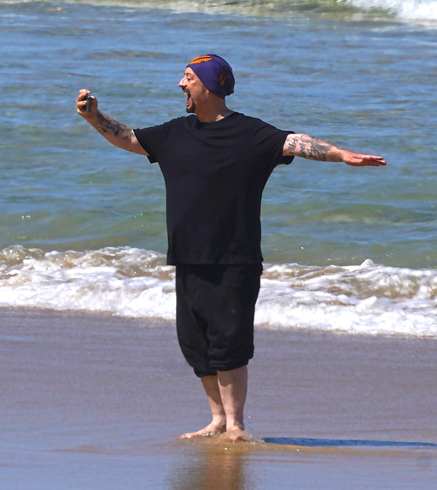 Boy George snapped photos as he took to the ocean