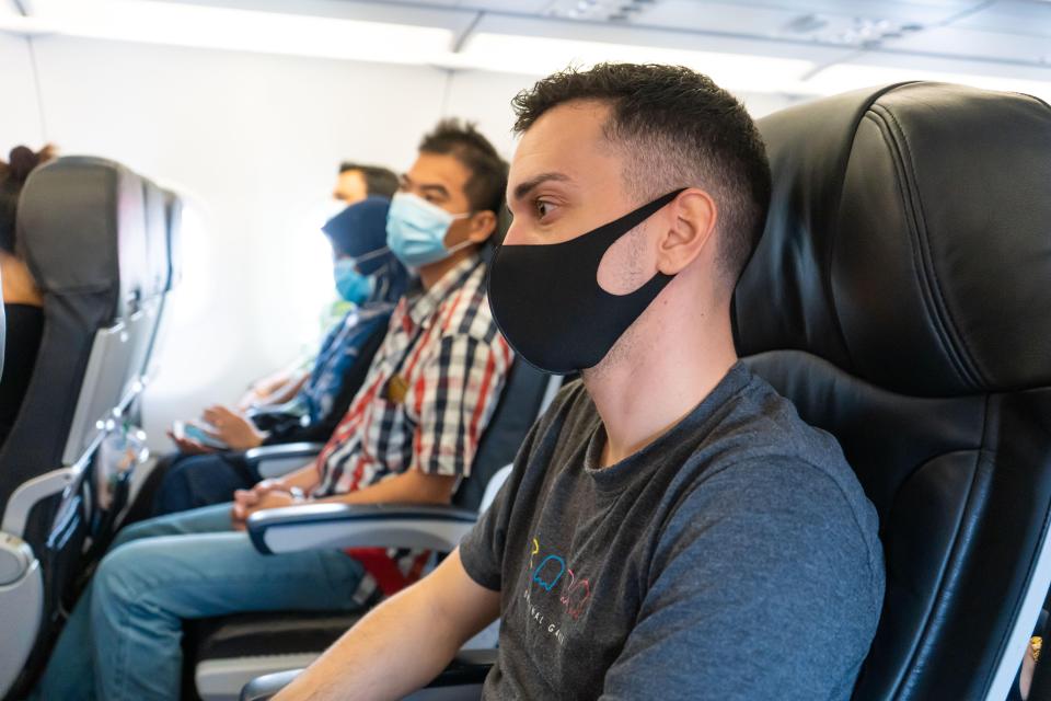 The man was sat in the aisle seat and wouldn't stand up to let the woman out (stock image)