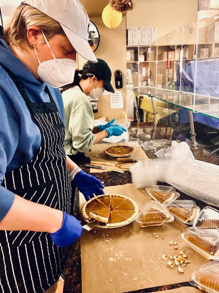 Meghan Markle lends a hand dishing up pumpkin pie for the women at a homeless shelter in LA