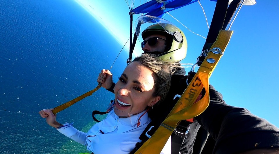 Olivia was seen skydiving from a helicopter during her first day