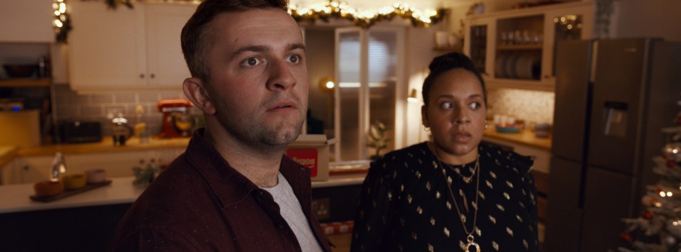 The ad sees a huge crowd of people descend on an unsuspecting couple on Christmas day