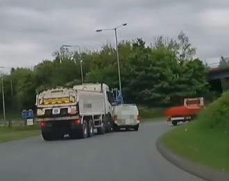 A van hit a truck as it cut in front of it