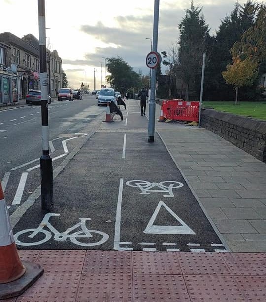 Photos shared on the Sowerby Bridge Chit Chat Facebook group show two lampposts bizarrely obstructing the bike lane in both directions.