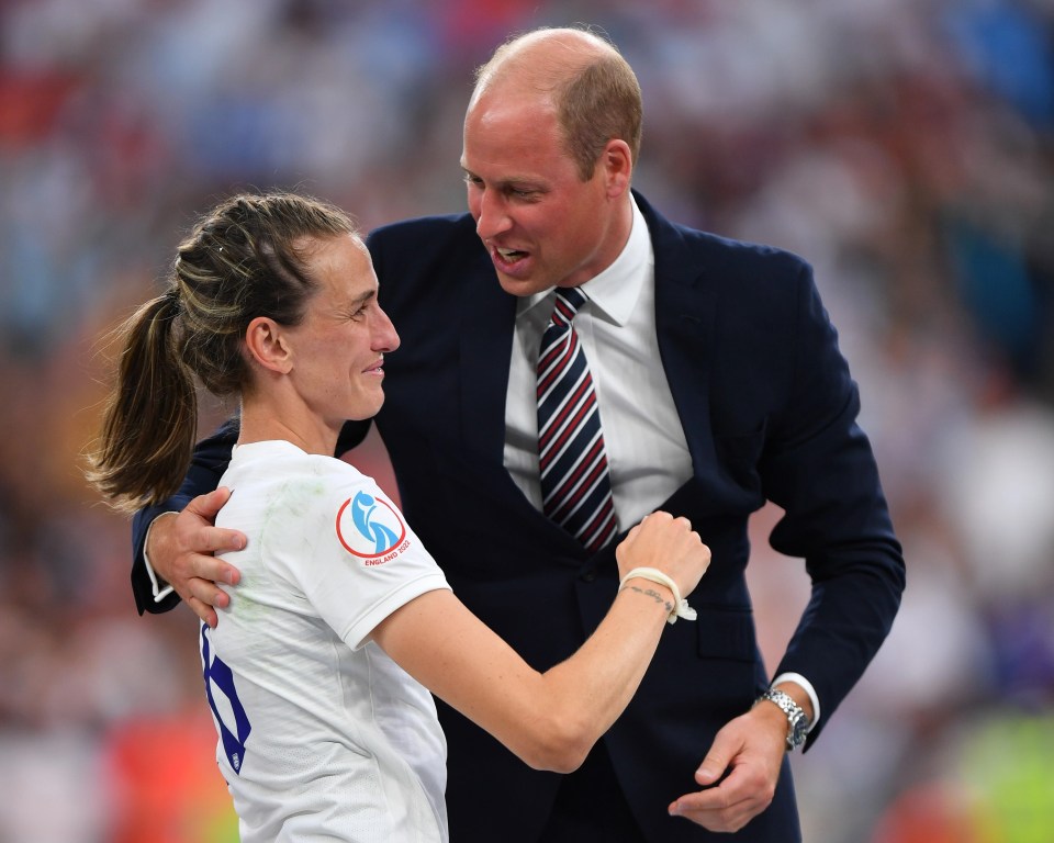 Jill Scott celebrating with Prince William after winning the UEFA Women's Euro trophy