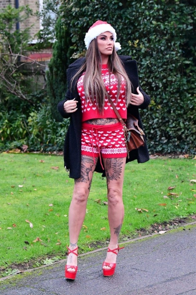 Katie showed off her tattoos in the festive-themed get up