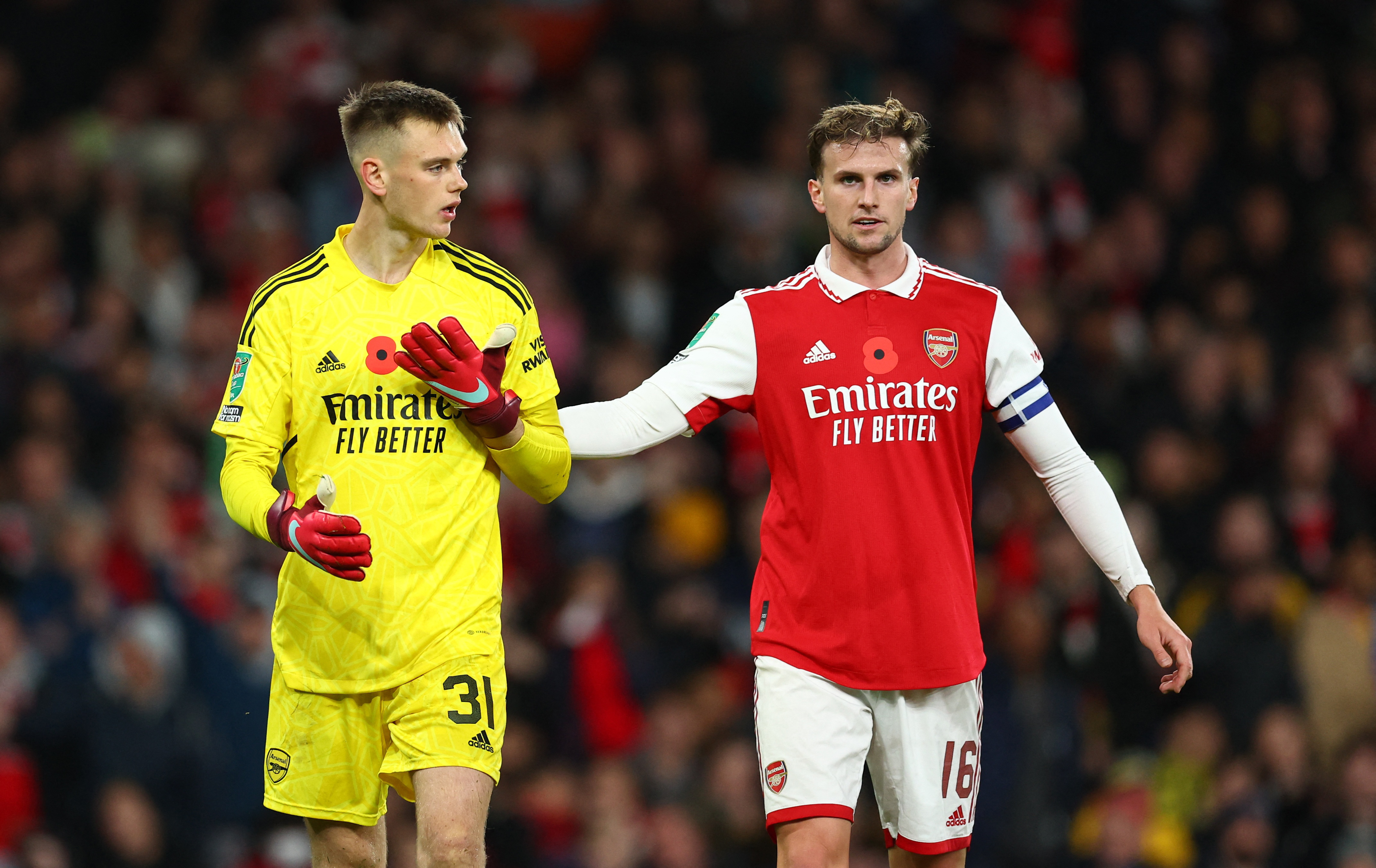 Hein is consoled by Rob Holding after his blunder