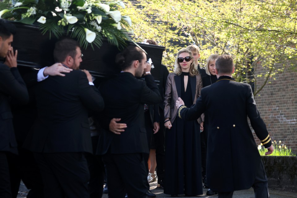 Kelsey looked on at Tom's funeral in April