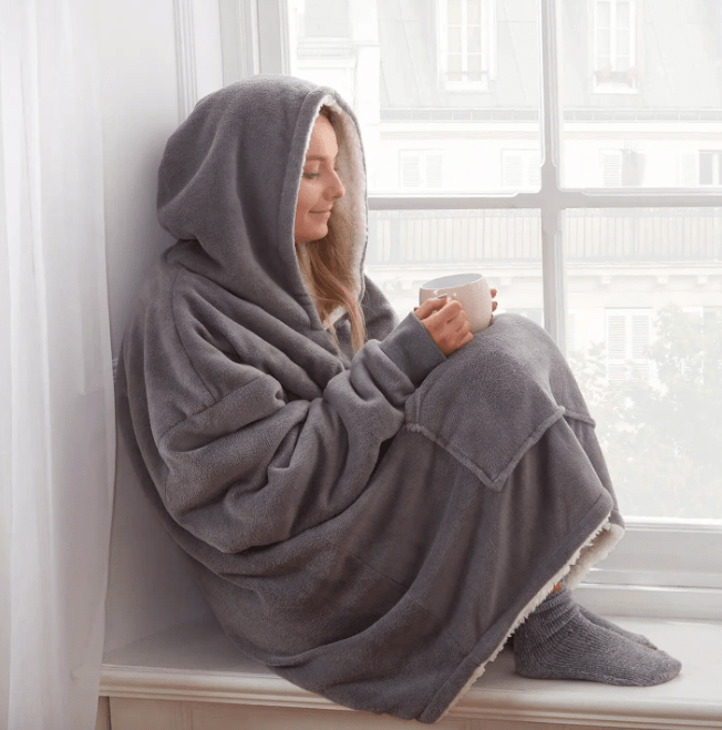 Snuggle up with this Hooded Fleece Blanket this season