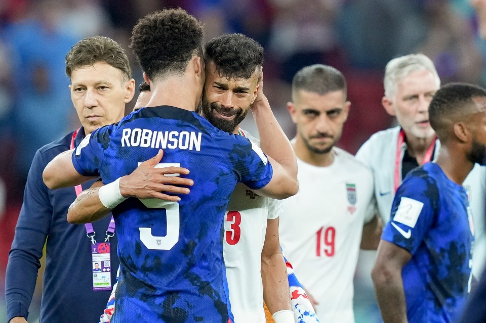 Antonee Robinson consoled Ramin Rezaeian after the final whistle