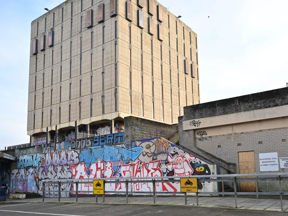 Graffiti covers a concrete building in Blackpool