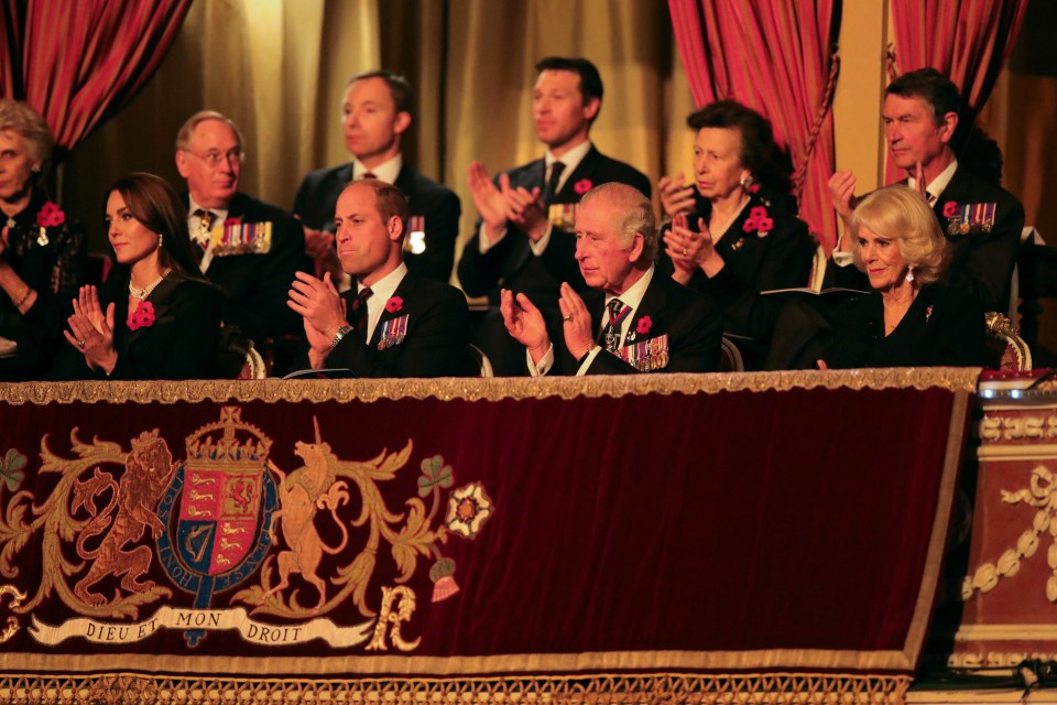 The King and Queen Consort sit alongside the Prince and Princess of Wales at the Festival of Remembrance