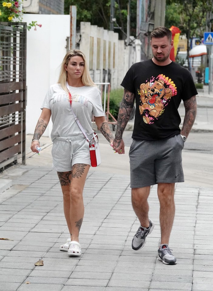 Katie Price was spotted with Carl Woods in Thailand as they headed to a cosmetic surgeon