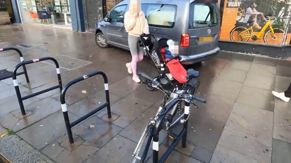 The moment the van nearly hits the mum and child in a pushchair