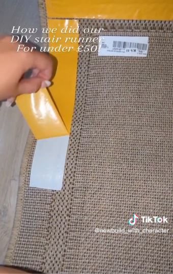 They taped the carpet runner to their stair